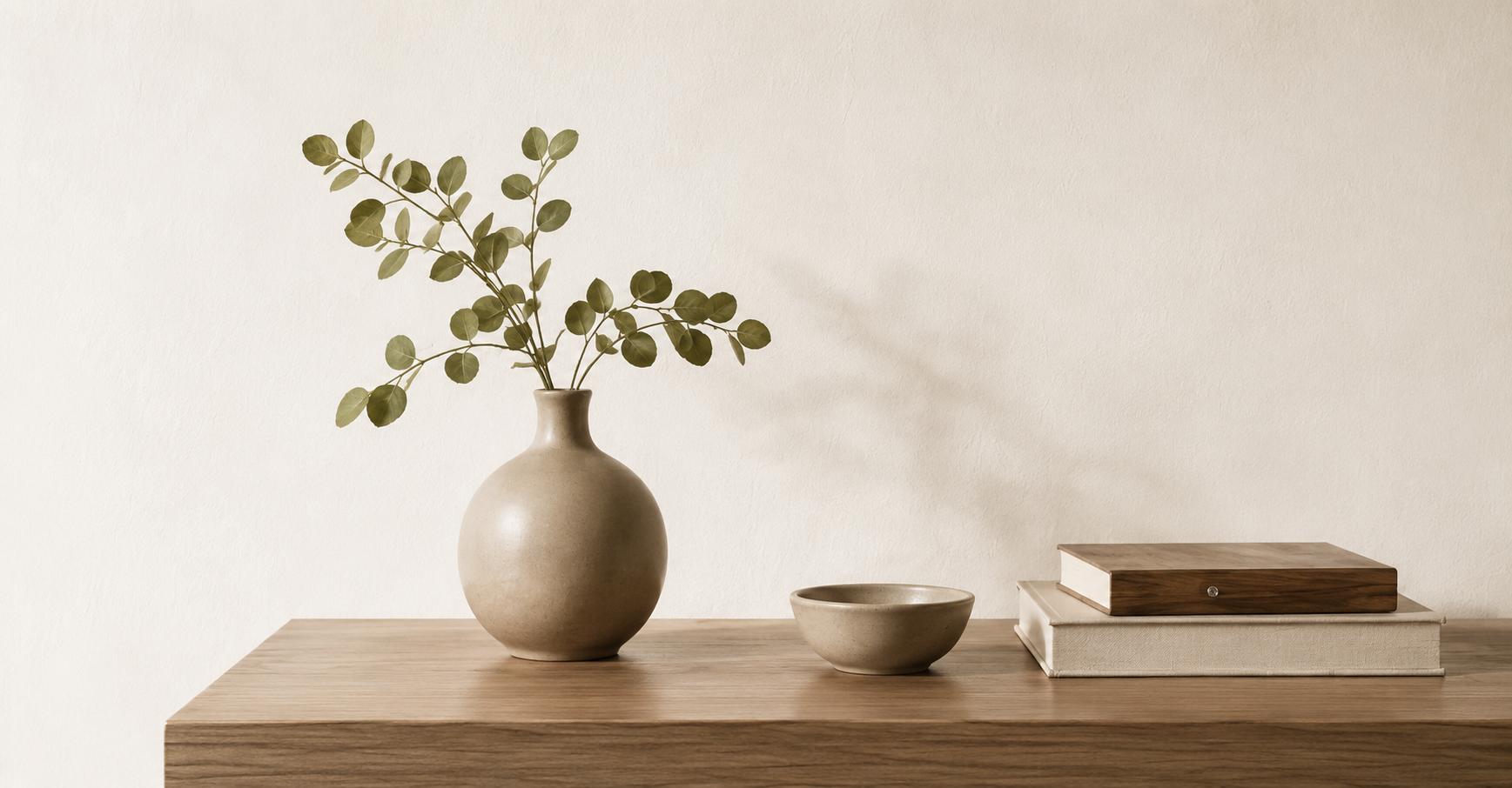 Serene still life with vase and greenery